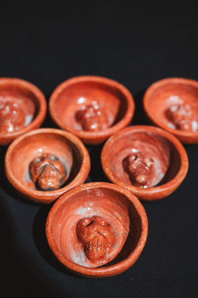 Handmade clay mezcalero cups from Oaxaca close view