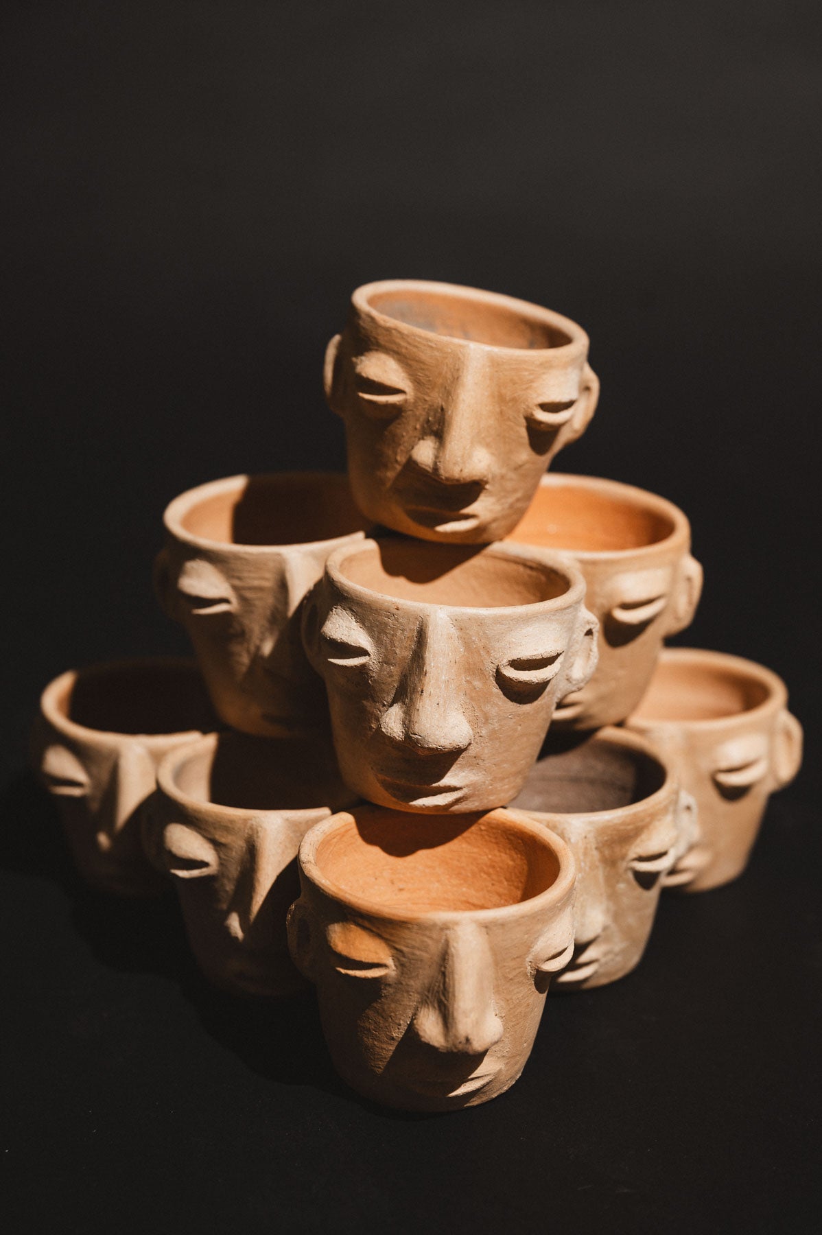 Handmade clay carita mezcalero cups from Oaxaca