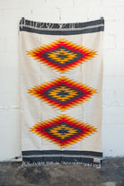 Red and yellow and black southwestern diamond handwoven blanket