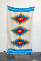 Red and yellow and blue southwestern diamond handwoven blanket