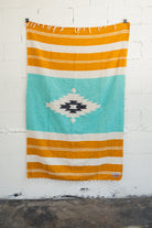 Turquoise and gold southwestern diamond handwoven blanket