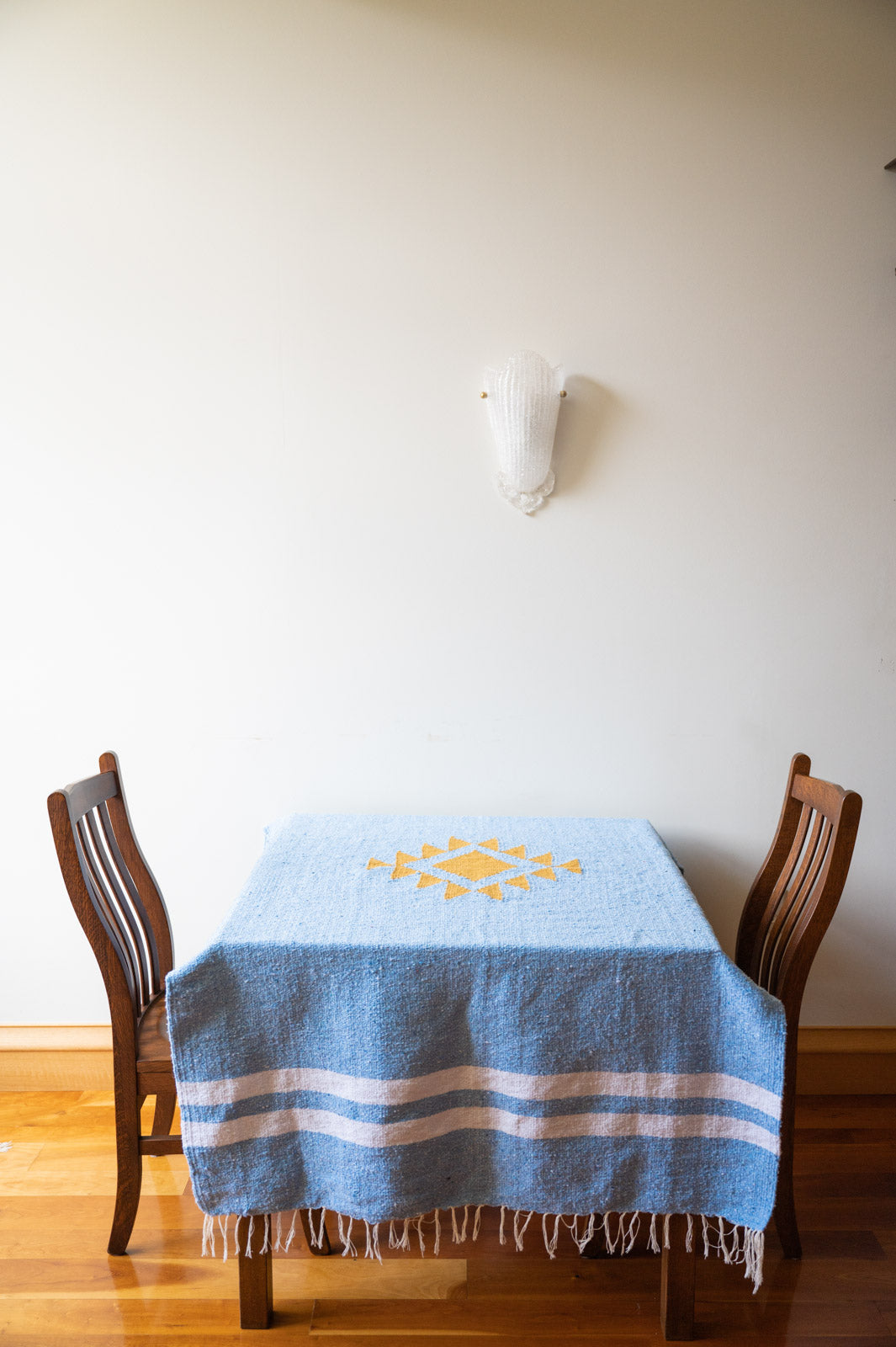 blue mexican blanket on a table top